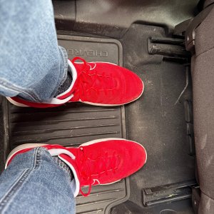Big feet. Normal car.
